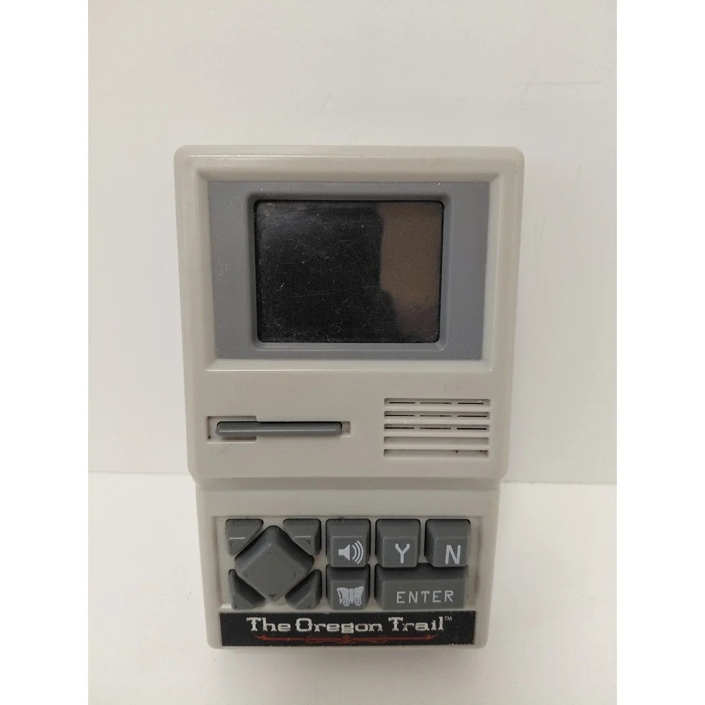 The Oregon Trail Handheld Electronic Game Basic Fun 09597 Retro Travel Toy Grey